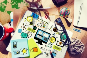 A creative workspace with a tablet displaying digital marketing icons and graphics, illustrating the concept of content in marketing.