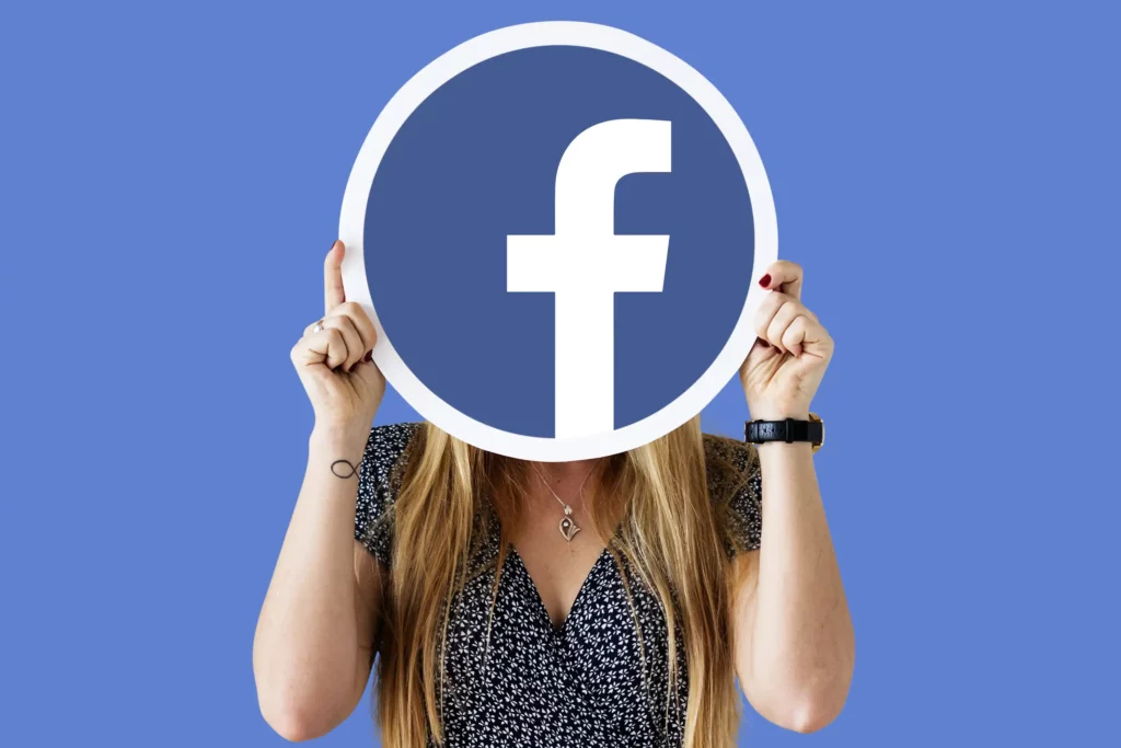 facebook ad mockup woman holding facebook sign