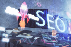 Multi exposure of table with computer and seo drawing hologram. Search optimization concept. Ahref vs SEMrush.