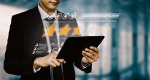 A business professional using a tablet with a holographic display of customer satisfaction metrics and a five-star rating system, symbolizing customer feedback and review analysis for keywords SEO services.