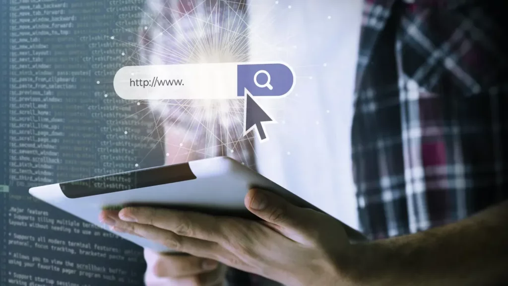 person-working-html-computer search google for filetype represented by someone holding a tablet with a large search bar overlayed